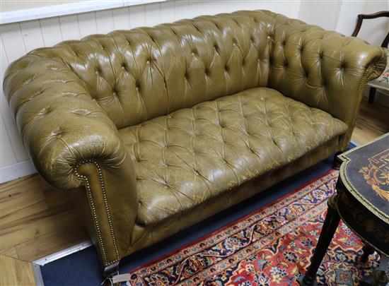 A buttonback leather Chesterfield settee W.170cm.